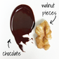 Melted chocolate and walnut piece ingredients found in Color Me Flavors chocolate walnut fudge