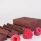 Slice of Color Me Flavors classic chocolate raspberry fudge with whole raspberries