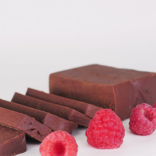 Slice of Color Me Flavors classic chocolate raspberry fudge with whole raspberries